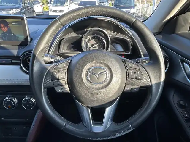 マツダ ＣＸ－３ XD ツーリング Lパッケージ 福岡県 2015(平27)年 10.6万km セラミックM ・純正ナビ（フルセグ・Bluetooth・DVD）/・バックカメラ/・ETC/・クルーズコントロール/・横滑り防止装置/・盗難防止装置/・HUD/・BMS/・D/N席シートヒーター/・ハーフレザーシート/・LEDヘッドライト/・オートライト/・ステアリングスイッチ/・パドルシフト/・電格ミラー