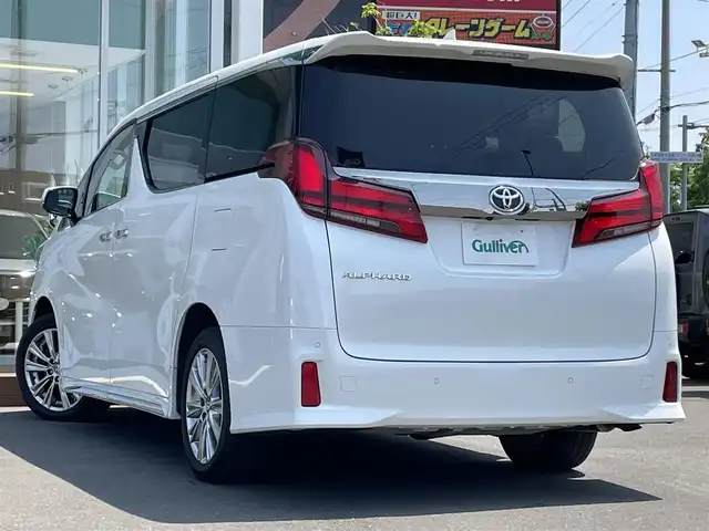 トヨタ アルファード S タイプゴールド 道央・札幌 2021(令3)年 3.8万km ホワイトパールクリスタルシャイン ・４WD/・衝突軽減ブレーキ/・純正ナビ/　CD＆DVD＆BT＆TV/・バックカメラ/・パワーバックドア/・両側パワースライドドア/・ハーフレザーシート/・アイドリングストップ/・レーンキープアシスト/・コーナーセンサー/・レーダークルーズコントロール/・オートエアコン/・オートライト/・デジタルインナーミラー/・ブラインドスポットモニター/・オートリトラミラー/・オートハイビーム/・ビルトインETC/・MT付きAT/・三眼LEDライト/・純正フロアマット/・ウィンカーミラー/・フォグライト/・スペアキー