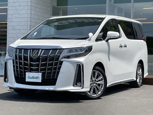 トヨタ アルファード S タイプゴールド 道央・札幌 2021(令3)年 3.8万km ホワイトパールクリスタルシャイン ・４WD/・衝突軽減ブレーキ/・純正ナビ/　CD＆DVD＆BT＆TV/・バックカメラ/・パワーバックドア/・両側パワースライドドア/・ハーフレザーシート/・アイドリングストップ/・レーンキープアシスト/・コーナーセンサー/・レーダークルーズコントロール/・オートエアコン/・オートライト/・デジタルインナーミラー/・ブラインドスポットモニター/・オートリトラミラー/・オートハイビーム/・ビルトインETC/・MT付きAT/・三眼LEDライト/・純正フロアマット/・ウィンカーミラー/・フォグライト/・スペアキー