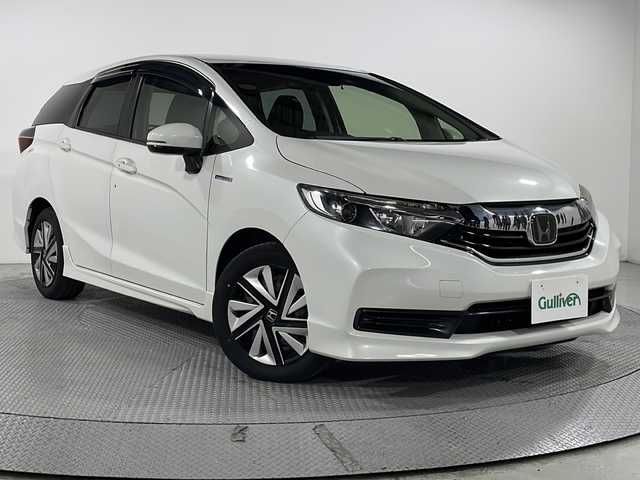 ホンダ シャトル ハイブリッド ホンダセンシング 広島県 2020(令2)年 4.2万km プラチナホワイトパール 社外ナビ/バックカメラ/ホンダセンシング/・衝突軽減ブレーキ/・レーンキープアシスト/・アダプティブクルーズコントロール/・誤発進抑制機能/LEDヘッドランプ/純正15インチホイールキャップ/ETC/スマートキー