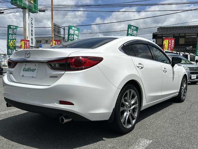 マツダ アテンザ セダン XD Lパッケージ 山口県 2013(平25)年 7.2万km スノーフレイクホワイトパールマイカ 社外ナビ/DVD/CD/BT/フルセグTV/バックカメラ/白レザーシート/前席パワーシート/シートヒーター/純正HIDヘッドライト/純正フォグランプ/オートライト/純正１９インチアルミホイール/革巻きステアリング/ステアリングスイッチ/パドルシフト/レーダークルーズコントロール/RVM/LKA/横滑り防止/スマートキー/ビルトインETC/純正フロアマット/純正ドアバイザー/電動格納ドアミラー