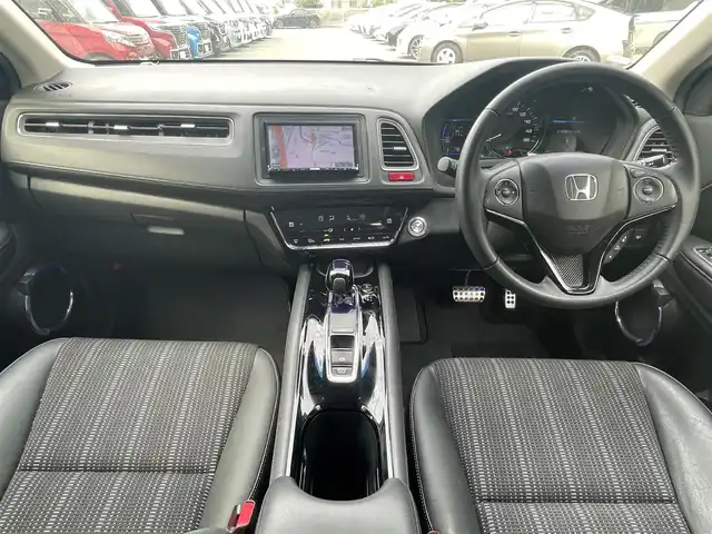ホンダ ヴェゼル ハイブリッド Z 栃木県 2014(平26)年 14.5万km ホワイトオーキッドパール (株)IDOMが運営する【じしゃロン宇都宮店】の自社ローン専用車両になります。こちらは現金またはオートローンご利用時の価格です。自社ローンご希望の方は別途その旨お申付け下さい/社外ナビ/バックカメラ/フルセグ/Ｂｌｕｅｔｏｏｔｈ/クルーズコントロール/パドルシフト/ハーフレザーシート/シートヒーター/ＬＥＤヘッドライト/フォグライト/オートライト/純正アルミホイール