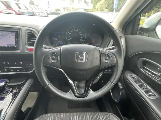 ホンダ ヴェゼル ハイブリッド Z 栃木県 2014(平26)年 14.5万km ホワイトオーキッドパール (株)IDOMが運営する【じしゃロン宇都宮店】の自社ローン専用車両になります。こちらは現金またはオートローンご利用時の価格です。自社ローンご希望の方は別途その旨お申付け下さい/社外ナビ/バックカメラ/フルセグ/Ｂｌｕｅｔｏｏｔｈ/クルーズコントロール/パドルシフト/ハーフレザーシート/シートヒーター/ＬＥＤヘッドライト/フォグライト/オートライト/純正アルミホイール