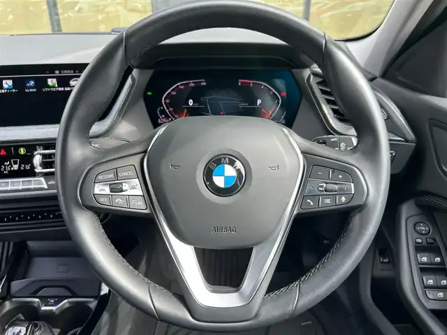 ＢＭＷ ＢＭＷ １１８ｄ 石川県 2021(令3)年 2.9万km 白 純正HDDナビ/　Bluetooth・AM/FM・USB・AppleCarPlay/全方位カメラ/ETC/前後ドライブレコーダー/アダプティブクルーズコントロール/ブラインドスポットモニター/パワーシート（D席）/シートメモリー/AUTO HOLD/アンチロック・ブレーキ・システム/衝突被害軽減システム/横滑り防止装置/前後コーナーセンサー/盗難防止装置/パーキングアシスト/アイドリングストップ/エアバッグ（W）/カーテンエアバッグ/純正アルミホイール/純正フロアマット/LEDヘッドライト/スマートキー/プッシュスタート/スペアキー×1