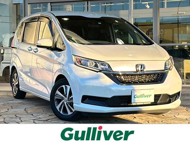 ホンダ フリード G ホンダセンシング 静岡県 2021(令3)年 4.1万km プラチナホワイトパール 純正ナビ/DVD/CD/AM/FM/フルセグ/SD/Bluetooth/USB/ipod/HDMI/主要装備/・純正ナビ　/・コーナーセンサー　/・バックカメラ　/・ＥＴＣ　/・オートライト　/・レーダークルコン　/・両側パワースライドドア　/・ドライブレコーダー　/・プッシュスタート　/・ＬＥＤヘッドライト　/・レーンキープ　/・シートヒーター/・衝突軽減システム/・盗難防止装置/・横滑り防止装置/・純正アルミホイール/・ウォークスルー
