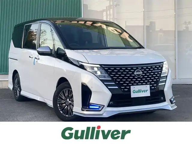 日産 セレナ e－パワー オーテック 福岡県 2023(令5)年 1.9万km パールⅡ カロッツェリアナビ/両側ハンズフリーパワースライドドア/全周囲カメラ/ビルトインETC/プロパイロット/エマージェンシーブレーキ/車線逸脱防止支援システム/後退時車両検知警報/衝突回避ステアリングアシスト/デジタルルームミラー/LEDヘッドランプ/革巻きステアリング/ステアリングヒーター/ブラック合皮シート/前席/2列目シートヒーター/2列目キャプテンシート/純正16インチアルミホイール/スマートキー/プッシュエンジンスターター/禁煙車