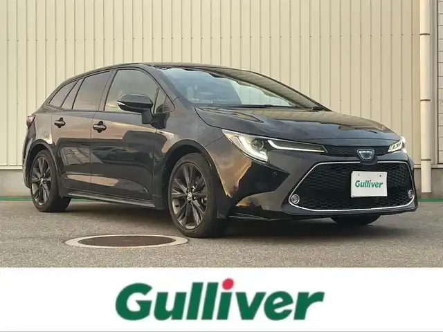 トヨタ カローラツーリング ハイブリッド ダブルバイビー 富山県 2021(令3)年 2.3万km スパークリングブラックパールクリスタルシャイン 純正ディスプレイオーディオ/Bluetooth/バックカメラ/ミラーキャスト/セーフティセンス/レーダークルーズコントロール/レーンキープアシスト/オートマチックハイビーム/ハーフレザーシート/コーナーセンサー/LEDオートライト/ＬＥＤフォグライト