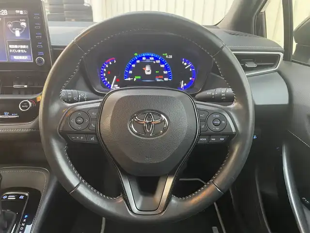 トヨタ カローラツーリング ハイブリッド ダブルバイビー 富山県 2021(令3)年 2.3万km スパークリングブラックパールクリスタルシャイン 純正ディスプレイオーディオ/Bluetooth/バックカメラ/ミラーキャスト/セーフティセンス/レーダークルーズコントロール/レーンキープアシスト/オートマチックハイビーム/ハーフレザーシート/コーナーセンサー/LEDオートライト/ＬＥＤフォグライト