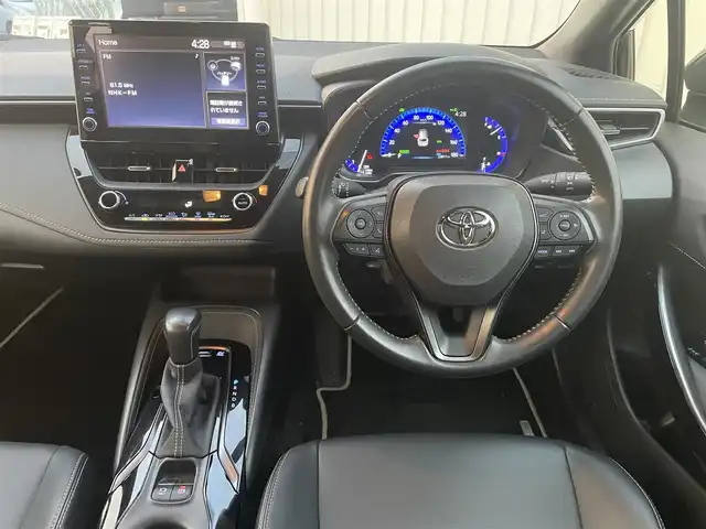 トヨタ カローラツーリング ハイブリッド ダブルバイビー 富山県 2021(令3)年 2.3万km スパークリングブラックパールクリスタルシャイン 純正ディスプレイオーディオ/Bluetooth/バックカメラ/ミラーキャスト/セーフティセンス/レーダークルーズコントロール/レーンキープアシスト/オートマチックハイビーム/ハーフレザーシート/コーナーセンサー/LEDオートライト/ＬＥＤフォグライト