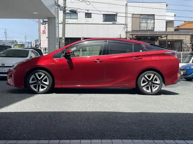 トヨタ プリウス S ツーリングセレクション 愛知県 2016(平28)年 9万km エモーショナルレッド (株)IDOMが運営する【じしゃロン豊川店】の自社ローン専用車両になります。こちらは現金またはオートローンご利用時の価格です。自社ローンご希望の方は別途その旨お申付け下さい/ 純正メモリナビ/　◯ CD再生機能/　◯ DVD再生機能/　◯ BT対応/　◯ ワンセグ/ ETC/ バックカメラ/ レザー調シート/ 前席シートヒーター/ 革巻ステアリング/ ステアリングスイッチ/ クルーズコントロール/ プッシュスタート/ ウインカーミラー/ トノカバー/ ドアバイザー/ 純正フロアマット