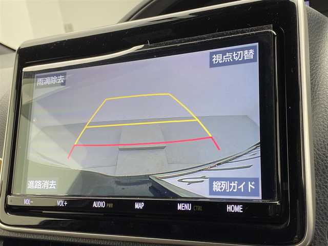 トヨタ エスクァイア ハイブリッド Gi プレミアムパッケージ 宮城県 2019(平31)年 2.8万km ブラッキッシュアゲハガラスフレーク 純正9インチナビ/（NSZT-Y68T)/純正フリップダウンモニター/純正OPエアロ/安全装備/・衝突被害軽減システム/・横滑り防止装置/・レーンキープアシスト/アイドリングストップ/クルーズコントロール/ETC/スマートキー/バックカメラ/フルセグテレビ/USB入力端子/ハーフレザー/シートヒーター/両側パワースライド/コーナーセンサー/ドライブレコーダー