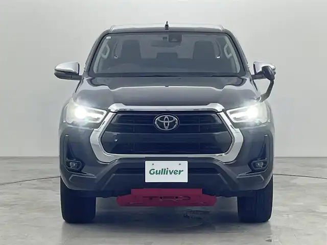 トヨタ ハイラックス Z 福岡県 2022(令4)年 5.8万km アティチュードブラックマイカ 純正ナビ（ＢＴ，フルセグＴＶ）　/バックカメラ　/ＥＴＣ　/レーダークルーズコントロール　/コーナーセンサー　/衝突被害軽減　/レーンキープ　/トランスファースイッチ/ヒルディセントコントロール　/ベッドライナー　/トノカバー　/TRDマッドフラップ