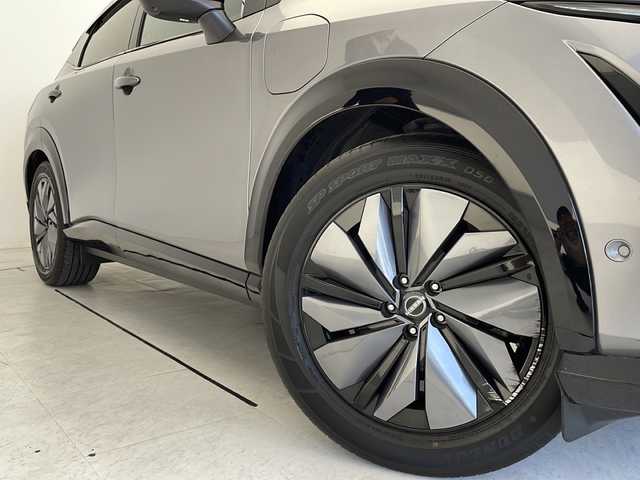 日産 アリア B6 愛知県 2022(令4)年 3.7万km ダークメタルグレー プロパイロット2.0/BOSEプレミアムサウンド/パノラミックガラスルーフ/純正11型ナビ/全方位カメラ/レーダークルーズコントロール/パーキングアシスト/シートヒーター/フルセグTV/AppleCarPlay/Android　Auto/電動リアゲート/パワーシート/ヘッドアップディスプレイ/コーナーセンサー/純正AW/コーナーセンサー/ルーフレール/ETC（2.0）/ブラインドスポットモニター/LEDヘッドライト/インテリジェントルームミラー/レーンキープアシスト/オートハイビーム/置くだけ充電/ドラレコ/ステアリングスイッチ/スマートキー/プッシュスタート
