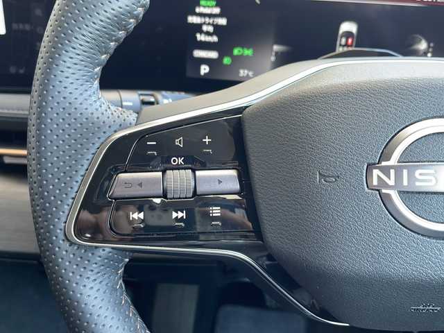 日産 アリア B6 愛知県 2022(令4)年 3.7万km ダークメタルグレー プロパイロット2.0/BOSEプレミアムサウンド/パノラミックガラスルーフ/純正11型ナビ/全方位カメラ/レーダークルーズコントロール/パーキングアシスト/シートヒーター/フルセグTV/AppleCarPlay/Android　Auto/電動リアゲート/パワーシート/ヘッドアップディスプレイ/コーナーセンサー/純正AW/コーナーセンサー/ルーフレール/ETC（2.0）/ブラインドスポットモニター/LEDヘッドライト/インテリジェントルームミラー/レーンキープアシスト/オートハイビーム/置くだけ充電/ドラレコ/ステアリングスイッチ/スマートキー/プッシュスタート