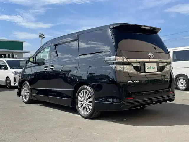 トヨタ ヴェルファイア 2．4Z ゴールデンアイズⅡ 東京都 2014(平26)年 8.4万km ブラック サンルーフ/フルエアロ/ALPINEナビ/ALPINE後席フリップダウンモニター/フルセグTV/DVD/CD/BT/両側電動スライドドア/パワーバックドア/クルーズコントロール/コーナーセンサー/ETC/後席シートオットマン/ハーフレザーシート/ドアバイザー/純正フロアマット/スマートキー