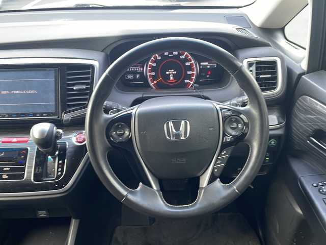 ホンダ オデッセイ アブソルート・Xホンダセンジング 京都府 2017(平29)年 6.6万km クリスタルブラックパール 純正８インチナビ　Ｂｌｕｅｔｏｏｔｈオーディオ　フルセグ　ＤＶＤ再生　バックカメラ　後席フリップダウンモニター　両側パワースライド　アダプティブクルーズコントロール　ＬＥＤヘッドライト　全方位ドラレコ