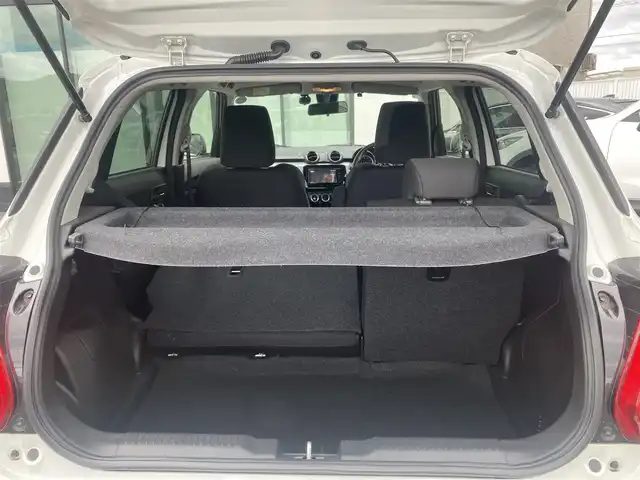 スズキ スイフト HYBRID MG 香川県 2021(令3)年 2.4万km ピュアホワイトP 登録時走行距離：23421km/パナソニックナビ/　CD DVD BT フルセグTV/バックカメラ/デュアルセンサーブレーキサポート/レーンキープアシスト/レーダークルーズコントロール/クリアランスソナー/アイドリングストップ/横滑り防止装置/オートライト/レベライザヘッドライト/ビルトインETC/シートヒーター/ステアリングスイッチ/プッシュスタート/スマートキー/スペアキー