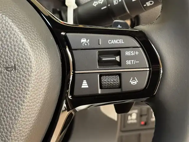 ホンダ ステップワゴン スパーダ eHEV 群馬県 2025(令7)年 0.1万km クリスタルブラックパール ホンダセンシング/・衝突軽減ブレーキ/・誤発進抑制機能/・歩行者事故低減ステアリング/・車線維持支援システム/・路外逸脱抑制機能/・標識認識機能/・先行車発進お知らせ機能/・アダプティブクルーズコントロール/・後方誤発進抑制機能/・近距離衝突軽減ブレーキ/・トラフィックジャムアシスト/・ブラインドスポットインフォメーション/・オートハイビーム/・アダプティブドライビングビーム/社外11インチナビ/・フルセグTV/・Bluetooth/・AUX/パワーバックドア/両側電動スライドドア/ハーフレザーシート/前席シートヒーター/パドルシフト/革巻きステアリング/ステアリングスイッチ/USBポート/スマートキー/プッシュスタート/LEDヘッドライト/フォグランプ/オートライト/ヘッドライトレベライザー/純正16インチAW/電動格納ウィンカーミラー