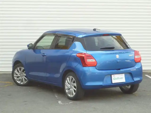 スズキ スイフト XG 和歌山県 2020(令2)年 3.7万km スピーディーブルーM 純正７インチSDナビ（CN-RZ765W)/  BT/TV/CD/DVD/USB/SUZUKIセーフティーサポート/・デュアルセンサーブレーキサポート/・車線逸脱抑制機能/・ハイビームアシスト/・アダプティブクルーズコントロール/ETCビルトイン/横滑り防止装置/USB入力端子/運転席シートヒーター/コーナーセンサー/全周囲カメラ/オートライト/純正アルミホイール/純正フロアマット/スペアキーx1/取扱説明書/保証書