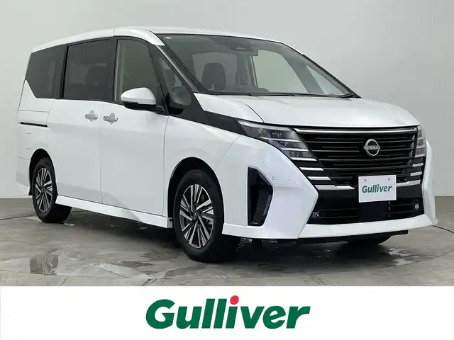 日産 セレナ e－パワー ハイウェイスター V 大分県 2023(令5)年 2.4万km プリズムホワイト 社外ナビ/TV/Bluetooth/バックカメラ/両側パワースライドドア/ＬＥＤヘッドライト/プロパイロット/ＥＴＣ/レーダークルーズ/プッシュスタート/電動パーキングブレーキ/フロアマット