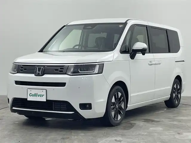 ホンダ ステップワゴン eHEV エアー EX 群馬県 2025(令7)年 0.1千km プラチナホワイトパール e:HEV エアー　EX　4CB4AP3　11.4インチナビHonda CONNECTナビ LXM-247VFLi(317900円)/登録済未使用車　純正１１．４インチナビ　バックカメラ　両側パワースライドドア　シートヒーター　ホンダセンシング　ＬＥＤヘッドライト　純正１６インチＡＷ　追従クルーズコントロール　２列目オットマン