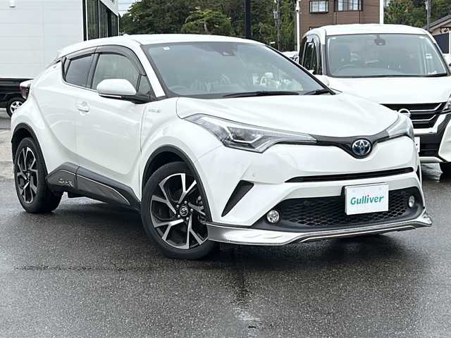トヨタ Ｃ－ＨＲ G 石川県 2017(平29)年 3.8万km ホワイトパールクリスタルシャイン 純正9型ナビ/（フルセグTV/BT/CD/DVD/SD/AM/FM)/-/OP/・【CH-R】ロゴ入LEDヘッドランプ/シーケンシャルターンランプ/LEDリアコンビネーションランプ/・ブラック革シート/・純正エアロセット（F、Rアンダー）純正サイドガーニッシュ/-/セーフティセンスP/レーダークルーズコントロール/ブラインドスポットモニター/クリアランスソナー/バックソナー/前席シートヒーター/ビルトインETC/LEDフロントフォグランプ/スマートキー/エンジンプッシュスタート/オートエアコン/ナノイー/保証書/取説/スペアキー1本