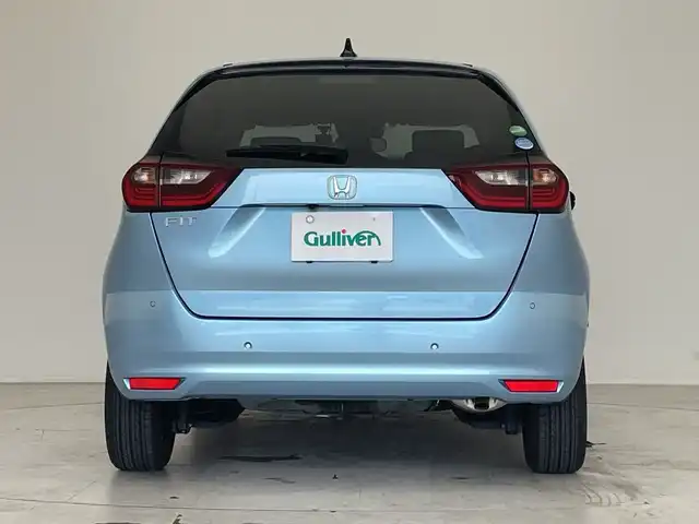 ホンダ フィット ベーシック 愛知県 2020(令2)年 1.9万km ライトブルー 純正9インチSDナビ（あり）/レーダークルーズコントロール/バックカメラ/コーナーセンサー/LEDヘッドライト/レーンキープアシスト/ドライブレコーダー/ETC/衝突被害軽減ブレーキ/フルセグTV/CD DVD/Bluetooth/ステアリングスイッチ/スマートキー/プッシュスタート