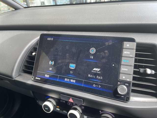 ホンダ フィット ベーシック 愛知県 2020(令2)年 1.9万km ライトブルー 純正9インチSDナビ（あり）/レーダークルーズコントロール/バックカメラ/コーナーセンサー/LEDヘッドライト/レーンキープアシスト/ドライブレコーダー/ETC/衝突被害軽減ブレーキ/フルセグTV/CD DVD/Bluetooth/ステアリングスイッチ/スマートキー/プッシュスタート