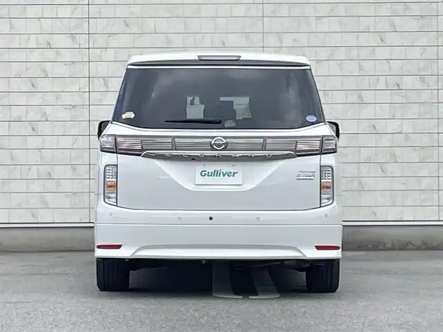 日産 エルグランド 350HWS アーバンクロム 福岡県 2021(令3)年 3.8万km ピュアホワイトパール 純正10型SDナビ(フルセグTV/CD/DVD/BT)/全方位/コーナーセンサー/ブラインドスポット/Wサンルーフ/後席フリップダウンモニター/クルコン/助手席オットマン/ドラレコ/電動リア/ETC/デジタルインナーミラー/USB/純正フロアマット/純正LED/純正アルミホイール/プッシュスタート/スペアキー