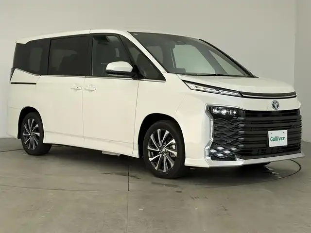 トヨタ ヴォクシー ハイブリッド S－Z 愛知県 2025(令7)年 0.1千km ホワイトパールクリスタルシャイン トヨタセーフティーセンス/トヨタチームメイト/快適便利パッケージHigh/純正10.5インチナビ/（Bluetooth/フルセグTV/AM/FM/CD/DVD/HDMI/AM/FM）/バックカメラ/ETC2.0/シートヒーター/ステアリングヒーター/オットマン/BSM/ハーフレザー/AC100V/HUD/3列シート/オートライト/スマートキー/プッシュスタート/電子パーキング/オートホールド