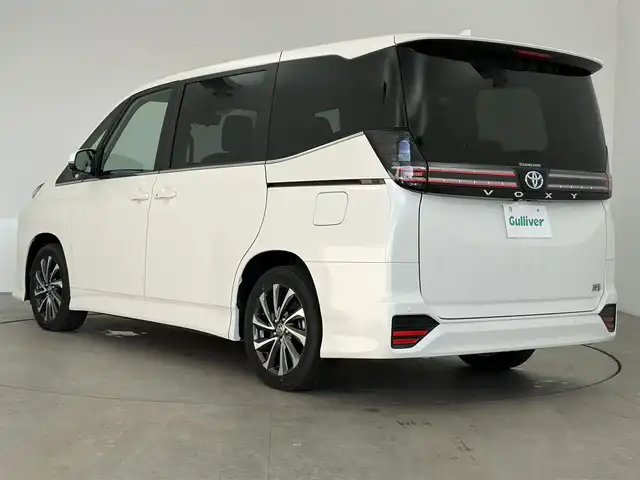 トヨタ ヴォクシー ハイブリッド S－Z 愛知県 2025(令7)年 0.1千km ホワイトパールクリスタルシャイン トヨタセーフティーセンス/トヨタチームメイト/快適便利パッケージHigh/純正10.5インチナビ/（Bluetooth/フルセグTV/AM/FM/CD/DVD/HDMI/AM/FM）/バックカメラ/ETC2.0/シートヒーター/ステアリングヒーター/オットマン/BSM/ハーフレザー/AC100V/HUD/3列シート/オートライト/スマートキー/プッシュスタート/電子パーキング/オートホールド