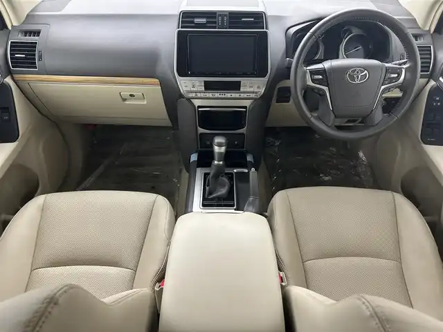 トヨタ ランドクルーザー プラド TX Lパッケージ マットブラED 埼玉県 2022(令4)年 1.6万km ホワイトパールクリスタルシャイン サンルーフ　純正９インチナビ　ＣＤ　ＤＶＤ　Ｂｌｕｅｔｏｏｔｈ　バックカメラ　パワーシート　ベージュレザーシート　シートヒーター　エアシート　オートクルーズ　トヨタセーフティセンス　ルーフレール