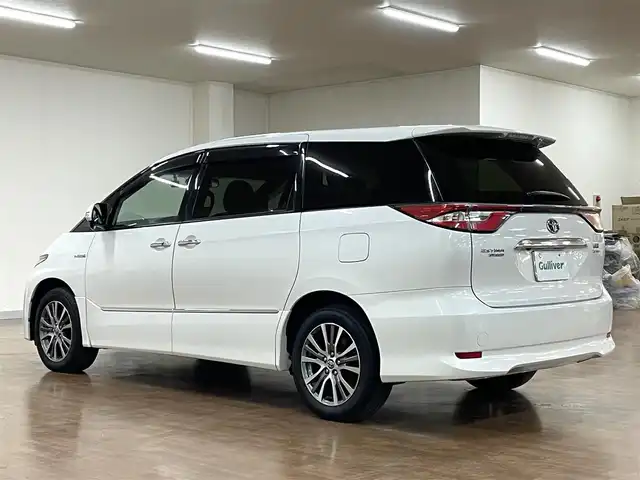 トヨタ エスティマ ハイブリッド アエラス スマート 道央・札幌 2016(平28)年 7.9万km ホワイトパールクリスタルシャイン 4WD/純正SDナビ/・フルセグTV/CD/DVD/BT/SD/バックカメラ/両側パワースライドドア/合成皮革シート/前席シートヒーター/運転席パワーシート/クルーズコントロール/ビルトインETC/衝突被害軽減ブレーキ/レーンキープアシスト/横滑り防止装置/オートマチックハイビーム/プッシュスタート/スマートキー/純正フロアマット/純正ドアバイザー/ウインカーミラー/オートライト/LEDヘッドライト/AC100V電源/2列目オットマン/3列シート/純正17インチAW/保証書/取扱説明書/ナビ説明書