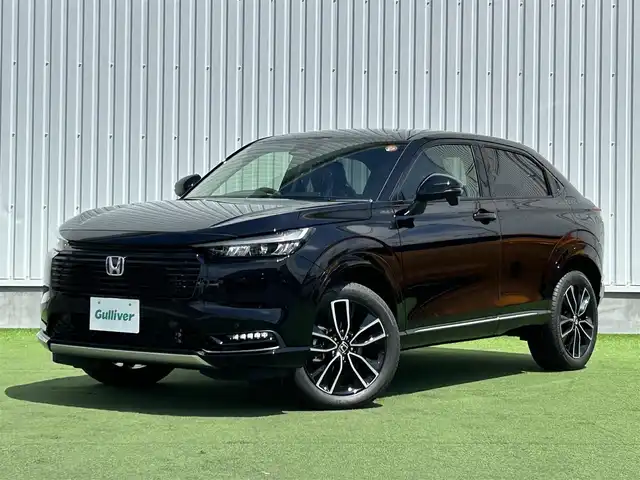 ホンダ ヴェゼル ハイブリッド e:HEV Z 香川県 2025(令7)年 0.1千km クリスタルブラックパール 登録時走行距離：3km/登録時未使用車　/ワイヤレス充電器　/純正ナビゲーション/→フルセグTV　/バックカメラ　/ＥＴＣ２．０　　/シートヒーター　/純正18インチＡＷ　/コーナーセンサー　/Ｗサイドエアバック　/カーテンエアバック　/スマートキー/スペアキー