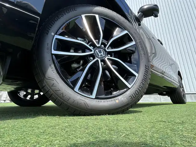 ホンダ ヴェゼル ハイブリッド e:HEV Z 香川県 2025(令7)年 0.1千km クリスタルブラックパール 登録時走行距離：3km/登録時未使用車　/ワイヤレス充電器　/純正ナビゲーション/→フルセグTV　/バックカメラ　/ＥＴＣ２．０　　/シートヒーター　/純正18インチＡＷ　/コーナーセンサー　/Ｗサイドエアバック　/カーテンエアバック　/スマートキー/スペアキー