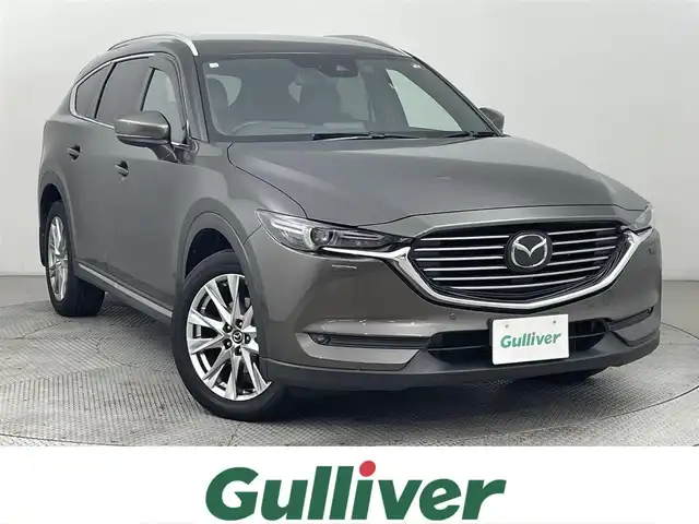 マツダ ＣＸ－８ XD Lパッケージ 道央・札幌 2018(平30)年 7.7万km チタニウムフラッシュマイカ ・４WD/・純正SDナビ/　BT/CD/DVD/USB/AUX/フルセグ/・ヘッドアップディスプレイ/・社外ETC/・純正前方ドライブレコーダー/・バックカメラ/・左サイドカメラ/・レーダークルーズコントロール/・スマートシティブレーキサポート/・レーンキープアシスト/・横滑り防止/・ブラインドスポットモニター/・ロードサインアシスト/・レザーシート/・前席シートヒーター/・セカンドシートシートヒーター/・ステアリングヒーター/・電動リアゲート/・前席パワーシート/・運転席シートメモリー/・純正フロアマット/・純正サマー19インチAW/・LEDヘッドライト/・オートライト/・オートマチックハイビーム/・プッシュスタート/・スマートキー/・スペアキー/・純正エンジンスターター/・取扱説明書/・保証書