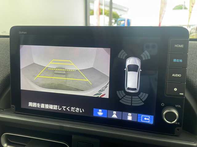 ホンダ フリード ハイブリット e:HEV AIR EX 大阪府 2025(令7)年 0.1千km プラチナホワイトパール 登録済未使用車/純正9インチナビLXM-242ZFNI/バックカメラ/両側パワースライドドア/前席シートヒーター/前後クリアランスソナー/ホンダセンシング/・アダブティブクルーズコントロール/・踏み間違い防止アシスト/・標識認識システム/・レーンキープアシスト/・路外逸脱抑制機能/・先行車発進お知らせ機能/・衝突軽減ブレーキ/・オートハイビーム/横滑り防止/ハーフレザーシート/電動パーキングブレーキ/ブレーキホールド/純正１５インチAW/オートライト/スマートキー/プッシュスタート/スペアキー1本/保証書/取扱説明書