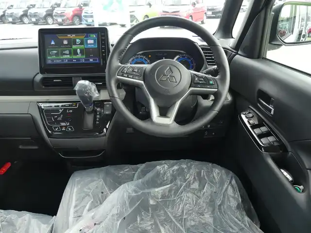 三菱 デリカミニ T プレミアム 千葉県 2025(令7)年 0.1千km アメジストブラック/シルキーホワイト T　PREMIUM　9型ディスプレイオーディオ（121/330）　サイドデカール（33440）/e-Assist/・衝突被害軽減ブレーキシステム（FCM）/・車線逸脱警報システム（LDW）/・誤発進抑制機能（前進＆後退時）（UMS）/・レーダークルーズコントロールシステム（ACC）/・オートマチックハイビーム[AHB]/マイパイロット/ハンズフリー両側パワースライドドア/ディスプレイオーディオ/【Bluetooth接続】/【Apple CarPlay　Android Auto対応】/マルチアラウンドモニター/デジタルインナーミラー/ステアリングヒーター/ステアリングスイッチ/革巻きステアリング/パドルシフト/LEDヘッドライト/フォグライト/ウインカーミラー/コーナーセンサー/純正15インチアルミホイル/サイド/カーテンエアバッグ/キーレスオペレーションシステム