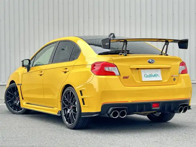 スバル ＷＲＸ ＳＴＩ S207 NBR チャレンジP イエローE 群馬県 2016(平28)年 1.7万km サンライズイエロー 100台限定車/社外ナビ(AM/FM/BT/SD/USB)/バックカメラ/ブラインドスポットモニター/前方ドラレコ/ステアリングリモコン/純正フロアマット/前席シートヒーター/横滑り防止/ETC/専用ドライカーボン製リアスポイラー/STI製RECAROフロントシート/HKSGT3タービン/HKSブローオフバルブ/HKSインタークーラー/HKSEVC/STI19インチアルミ/Defi追加メーター/社外エキマニ/スペアスマート/取扱説明書/記録簿