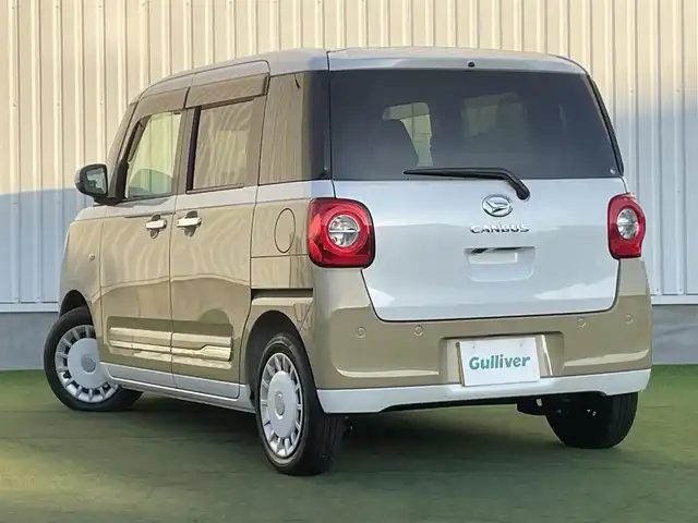ダイハツ ムーヴ キャンバス ストライプス G ターボ 香川県 2023(令5)年 0.1万km シャイニングホワイトパール/サンドベージュメタリック 登録時走行距離1036km/純正10型ナビ【NMZN-Z73DS】/（HDMI/フルセグTV/Bluetooth/DVD/MSV/USB）/バックカメラ/純正ドライブレコーダー（ナビ連動）/レーダー探知機/両側電動スライドドア（ウェルカムオープン機能）/衝突軽減ブレーキ/レーンキープアシスト/コーナーセンサー/アダプティブクルーズコントロール/電動パーキングブレーキ/オートブレーキホールド/ステアリングスイッチ/白革調シートカバー/前席シートヒーター/ホッとカップホルダー（保温機能）/オートライト/LEDヘッドライト/LEDフォグライト/ETC/純正フロアマット/純正ドアバイザー/オート開閉機能付電動格納ミラー/ISOFIX/スマートキー/プッシュスタート