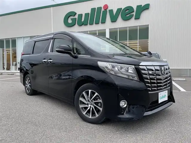 トヨタ アルファード G 石川県 2015(平27)年 7.1万km ブラック 4WD/純正9型メモリーナビ/CD/DVD/フルセグTV/バックカメラ/LEDヘッドライト/LEDフォグランプ/Dパワーシート/両側パワースライドドア/ドライブレコーダー/ETC/純正アルミホイール/スマートキー/プッシュスタート/ハーフレザーシート/クルーズコントロール