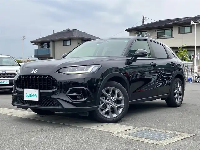 ホンダ ＺＲ－Ｖ ハイブリッド e:HEV X 静岡県 2023(令5)年 2.7万km クリスタルブラックパール エンジンスタートボタン/スマートキー/ワンオーナー/パワーステアリング/パワーウィンドウ/MTモード付AT/アイドリングストップ/オートエアコン/クルーズコントロール/全方位カメラ/ETC2.0/USB入力端子/純正ナビ（BT.フルセグ）/ドライブレコーダー前後/電動リアゲート/純正フロアマット/純正アルミホイール/ABS/横滑り防止装置/コーナーセンサー前後/レーンキープアシスト/オートライト/オートマチックハイビーム/ダウンヒルアシストコントロール/LEDヘッドライト/Wプラスサイドエアバック/カーテンエアバック/Honda SENSING/ブラインドスポットインフォメーション/後退出庫サポート/マルチビューカメラシステム/Honda CONNECTディスプレー＋ETC2.0車載器＋ワイヤレス充電器/パワーテールゲート(予約クローズ機能付)