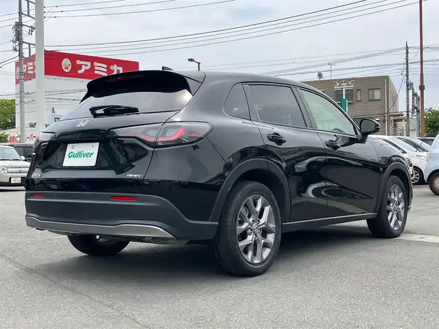 ホンダ ＺＲ－Ｖ ハイブリッド e:HEV X 静岡県 2023(令5)年 2.7万km クリスタルブラックパール エンジンスタートボタン/スマートキー/ワンオーナー/パワーステアリング/パワーウィンドウ/MTモード付AT/アイドリングストップ/オートエアコン/クルーズコントロール/全方位カメラ/ETC2.0/USB入力端子/純正ナビ（BT.フルセグ）/ドライブレコーダー前後/電動リアゲート/純正フロアマット/純正アルミホイール/ABS/横滑り防止装置/コーナーセンサー前後/レーンキープアシスト/オートライト/オートマチックハイビーム/ダウンヒルアシストコントロール/LEDヘッドライト/Wプラスサイドエアバック/カーテンエアバック/Honda SENSING/ブラインドスポットインフォメーション/後退出庫サポート/マルチビューカメラシステム/Honda CONNECTディスプレー＋ETC2.0車載器＋ワイヤレス充電器/パワーテールゲート(予約クローズ機能付)