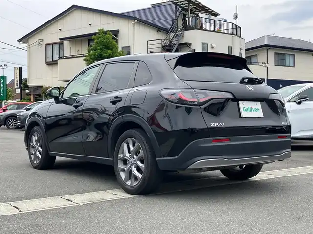 ホンダ ＺＲ－Ｖ ハイブリッド e:HEV X 静岡県 2023(令5)年 2.7万km クリスタルブラックパール エンジンスタートボタン/スマートキー/ワンオーナー/パワーステアリング/パワーウィンドウ/MTモード付AT/アイドリングストップ/オートエアコン/クルーズコントロール/全方位カメラ/ETC2.0/USB入力端子/純正ナビ（BT.フルセグ）/ドライブレコーダー前後/電動リアゲート/純正フロアマット/純正アルミホイール/ABS/横滑り防止装置/コーナーセンサー前後/レーンキープアシスト/オートライト/オートマチックハイビーム/ダウンヒルアシストコントロール/LEDヘッドライト/Wプラスサイドエアバック/カーテンエアバック/Honda SENSING/ブラインドスポットインフォメーション/後退出庫サポート/マルチビューカメラシステム/Honda CONNECTディスプレー＋ETC2.0車載器＋ワイヤレス充電器/パワーテールゲート(予約クローズ機能付)