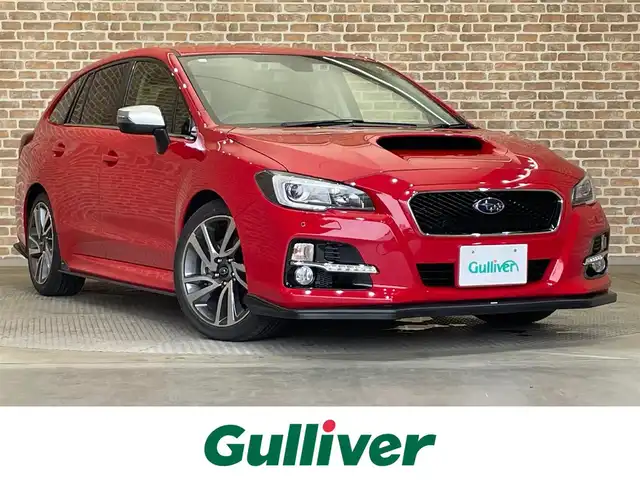スバル レヴォーグ 1．6GT－S アイサイト 岩手県 2015(平27)年 1.7万km ピュアレッド ワンオーナー/４WD/ターボ/本革シート/STIスポイラー/STIフレキシブルタワーバー/ビルシュタインダンパー/SYMSレーシングマフラー/Blitzスロットコントローラー/パドルシフト/前席パワーシート（運転席メモリ機能付き）/前席シートヒーター/アイサイトVer.3/アドバンスドセイフティパッケージ/全車速追従機能付きクルーズコントロール/アクティブレーンキープ/プリクラッシュブレーキ/コーナーセンサー/リヤビークルディテクション/バック・サイドモニター/純正Panasonicナビ/（CD/DVD/フルセグ/SD/USB/AUX/Bluetooth）/ステアリングスイッチ/ETC/ドライブレコーダー/LEDヘッドランプ/フロント・リヤフォグランプ/純正18インチアルミホイール