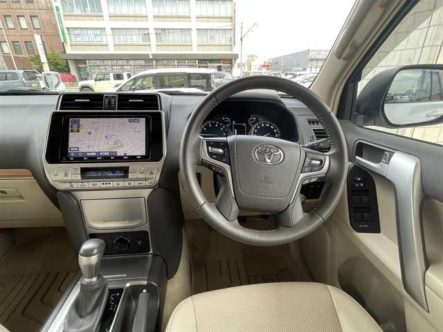 トヨタ ランドクルーザー プラド TX Lパッケージ 青森県 2021(令3)年 4.2万km ホワイトパールクリスタルシャイン 7人/サンルーフ/純正ＳＤナビフルセグ（ＮＳＺＴ－Ｙ６８Ｔ）/バックモニター/本革シート/純正17AW/シートヒーター/クリアランスソナー/純正エンスタ/ビルトインＥＴＣ/ＬＥＤヘッドライト/ディーラー記録簿５枚/新車時保証書/取扱説明書