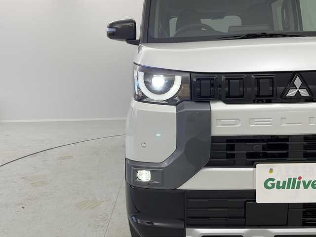 三菱 デリカミニ T プレミアム 茨城県 2025(令7)年 0.1千km アメジストブラック/シルキーホワイト 届出済未使用車　純正９インチディスプレイオーディオ　衝突軽減ブレーキ　マイパイロット　レーダークルーズコントロール　レーンキープアシスト　全周囲カメラ　両側電動スライドドア　前席シートヒーター　