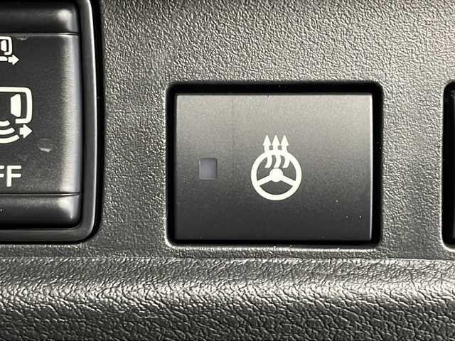 三菱 デリカミニ T プレミアム 茨城県 2025(令7)年 0.1千km アメジストブラック/シルキーホワイト 届出済未使用車　純正９インチディスプレイオーディオ　衝突軽減ブレーキ　マイパイロット　レーダークルーズコントロール　レーンキープアシスト　全周囲カメラ　両側電動スライドドア　前席シートヒーター　