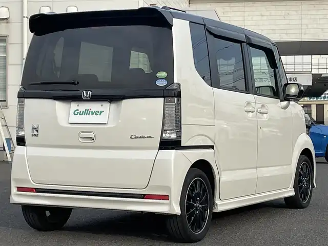 ホンダ Ｎ ＢＯＸ 2トーン カスタム G ターボLパッケージ 栃木県 2015(平27)年 6.1万km プレミアムホワイトパールⅡ ワンオーナー/社外ディスプレイオーディオ/【FM/AM/CD/ワンセグTV】/バックカメラ/ETC/両側パワースライドドア/ハーフレザーシート/ベンチシート/クルーズコントロール/横滑り防止装置/盗難防止装置/LEDヘッドライト/オートライト/プッシュスタート/スマートキー/純正フロアマット