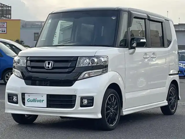 ホンダ Ｎ ＢＯＸ 2トーン カスタム G ターボLパッケージ 栃木県 2015(平27)年 6.1万km プレミアムホワイトパールⅡ ワンオーナー/社外ディスプレイオーディオ/【FM/AM/CD/ワンセグTV】/バックカメラ/ETC/両側パワースライドドア/ハーフレザーシート/ベンチシート/クルーズコントロール/横滑り防止装置/盗難防止装置/LEDヘッドライト/オートライト/プッシュスタート/スマートキー/純正フロアマット